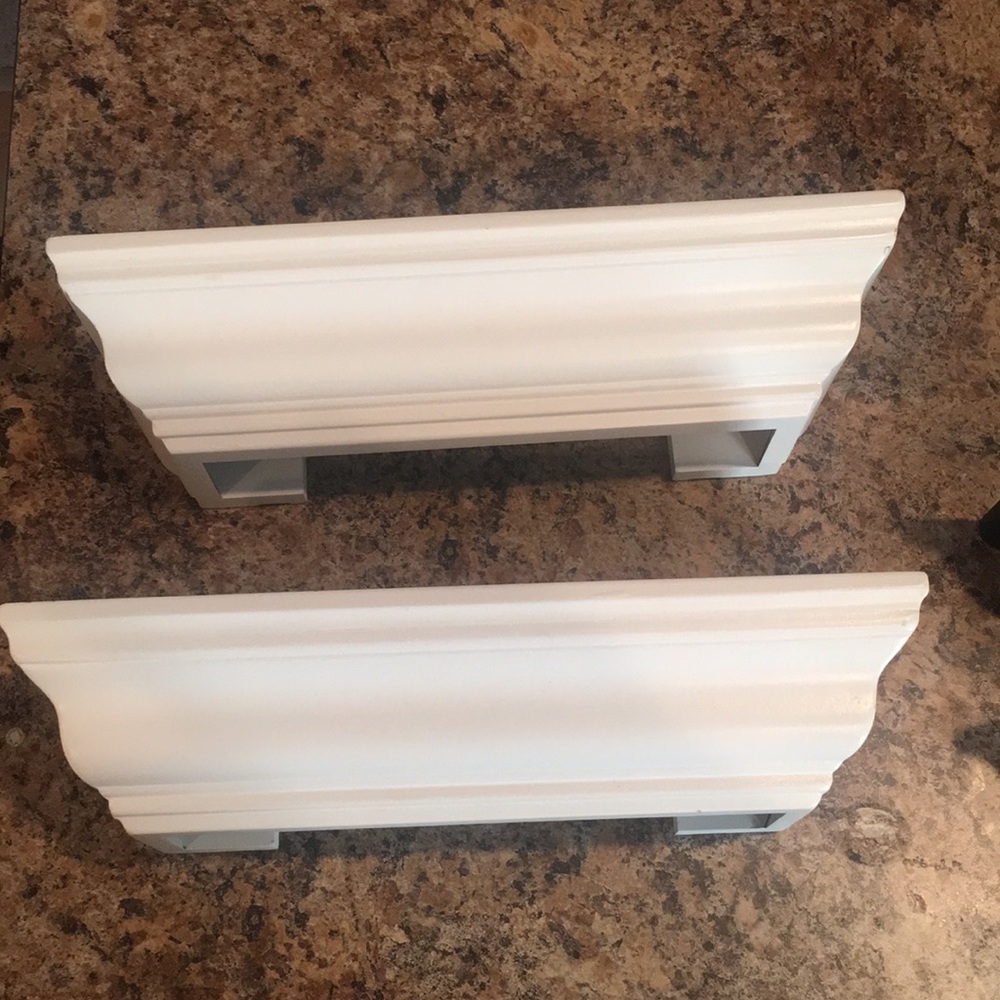 Two white floating shelves